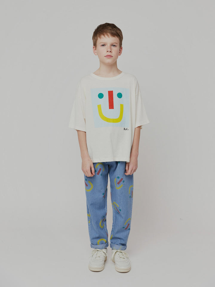 Happy face all over baggy denim pants