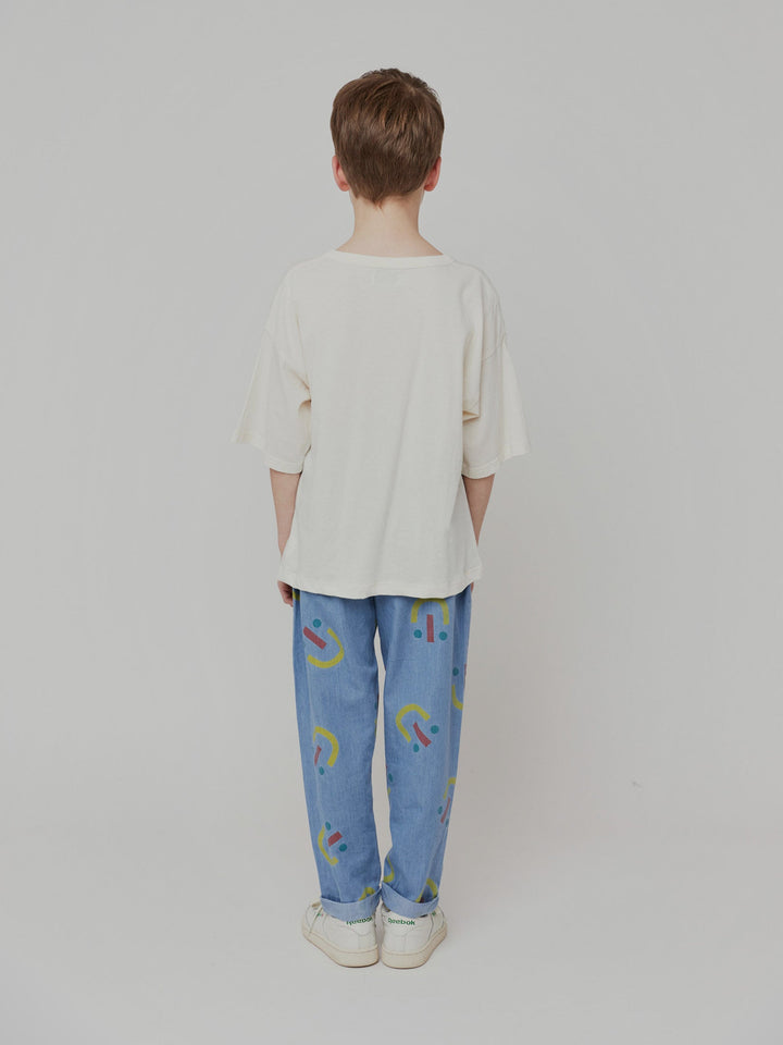 Happy face all over baggy denim pants